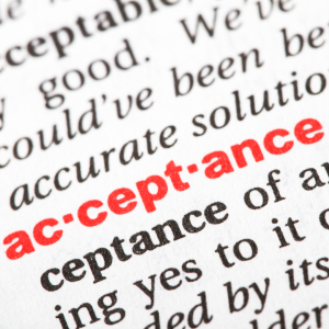 Na imagem: A palavra 'Aceitação' em inglês, acceptance.